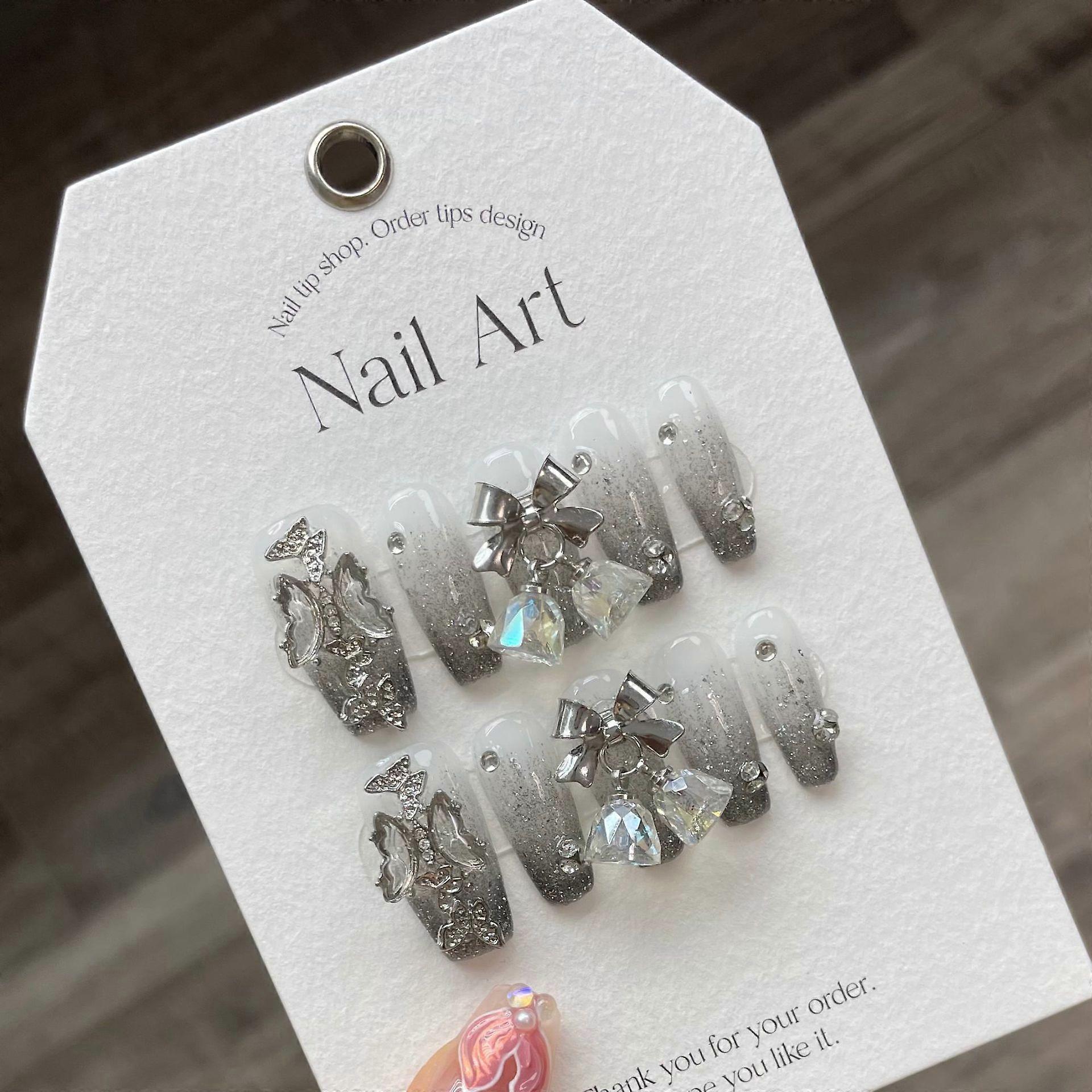 つけ爪。釘を着用するためにプレスし、完成品を分解し、再利用可能。フェイクネイルモデル:Lサイズ