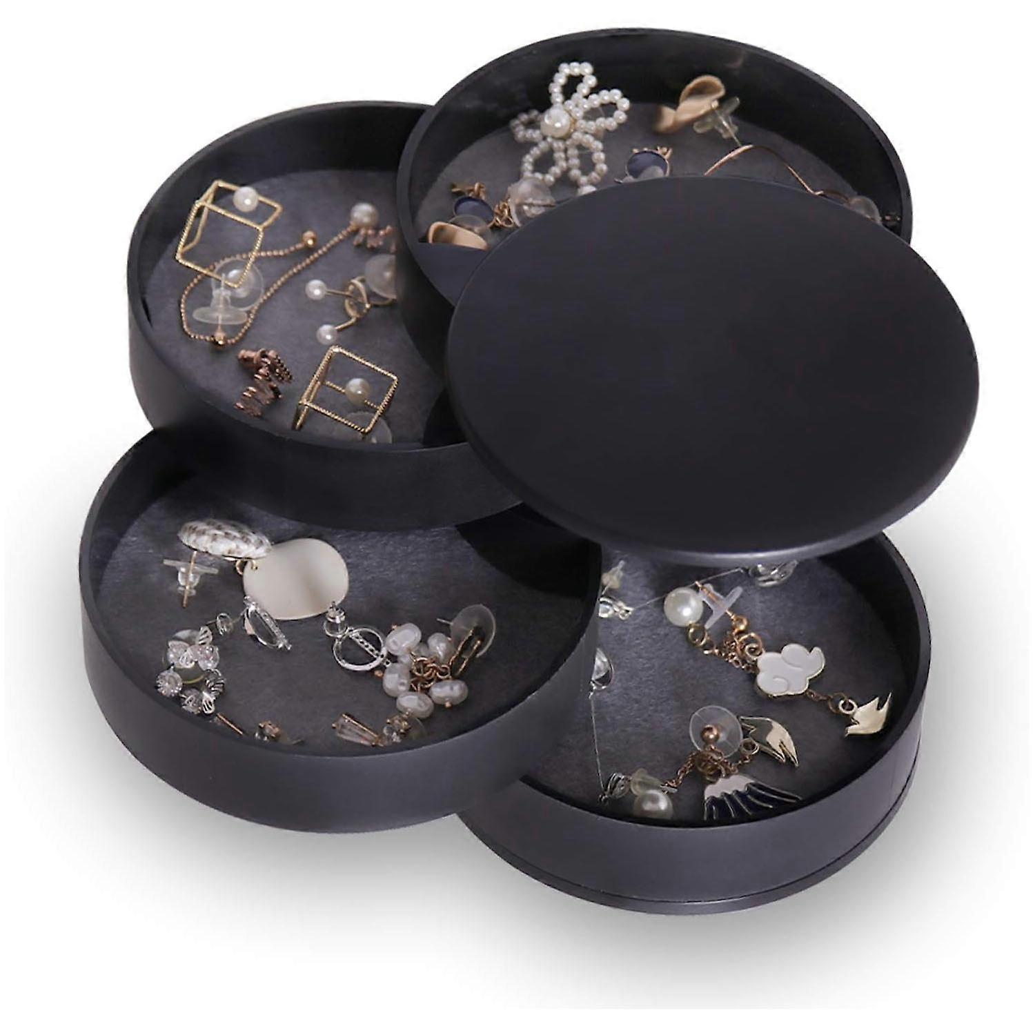 Black, rotating jewelry box with 4 levels