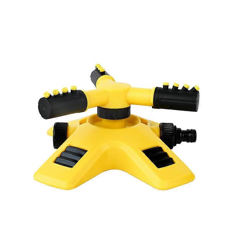 Yellow automatic lawn sprinkler, outdoor irrigation, automatic watering