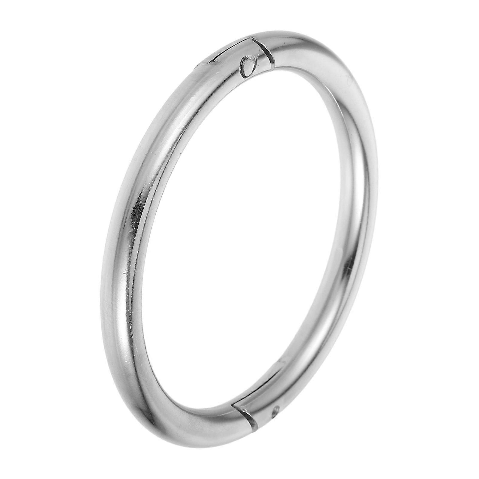 Durable Bull Nose Ring for Secure Livestock Handling on Farms