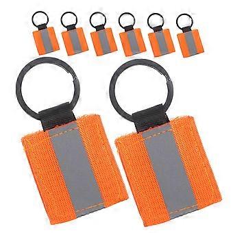 8 stuks oranje reflecterende sleutelhangers met dubbelzijdige ritssluiting voor extra zichtbaarheid en veiligheid van rugzakken
