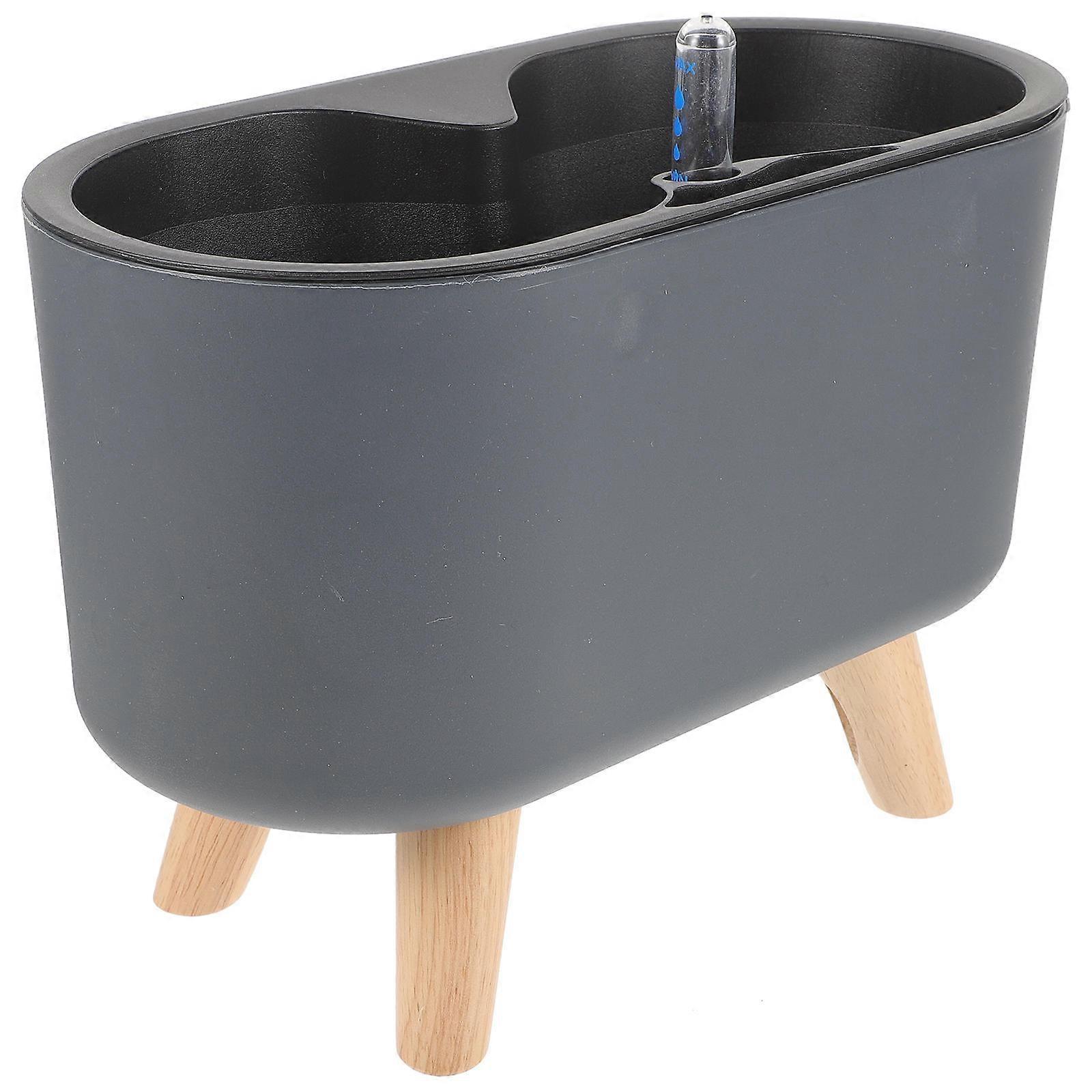 The **Automatic Self Watering Flower Pot with Water Level Gauge** is , modern plant container designed to simplify plant care while adding a stylish