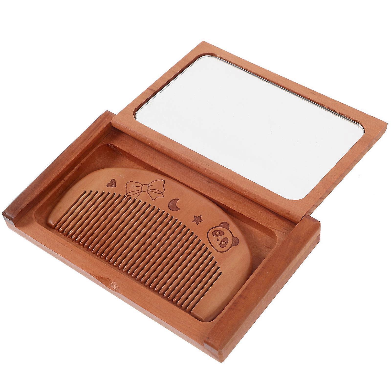 Here's a well structured product description for a **Small Handheld Mirror with Comb**, ideal for women who are always on the go:
### **Portable
