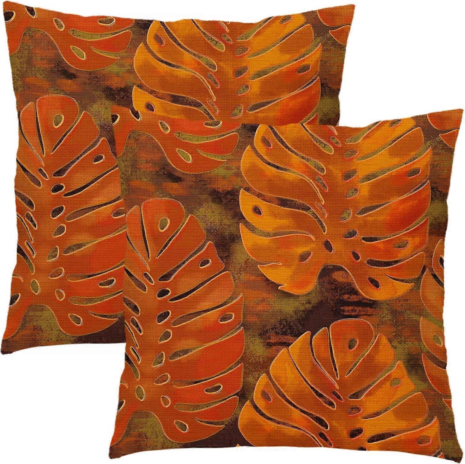 焦げたオレンジの葉の枕カバー18X18インチの夏の熱帯モンステラの葉植物の装飾的な枕カバー2つの植物綿リネンスロー枕のセット