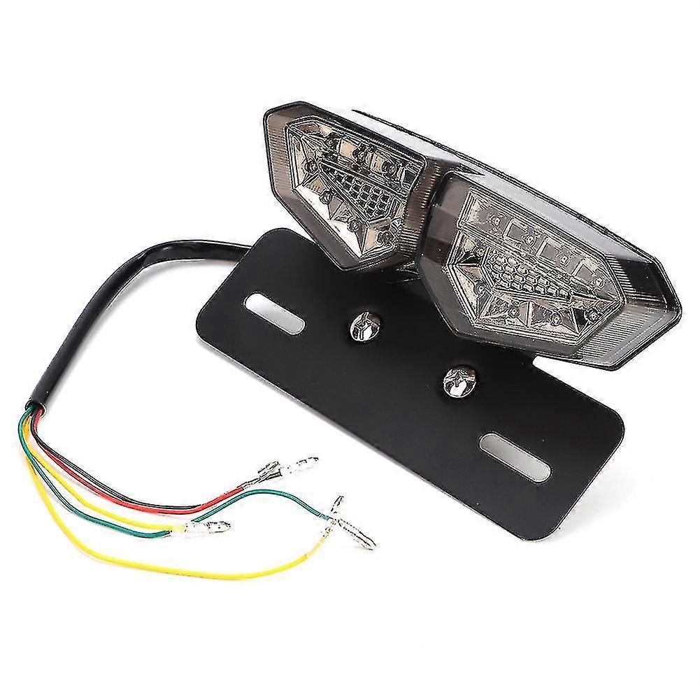 Motorcycle Tail Light with Brake Lamp and Turn Signal Indicators