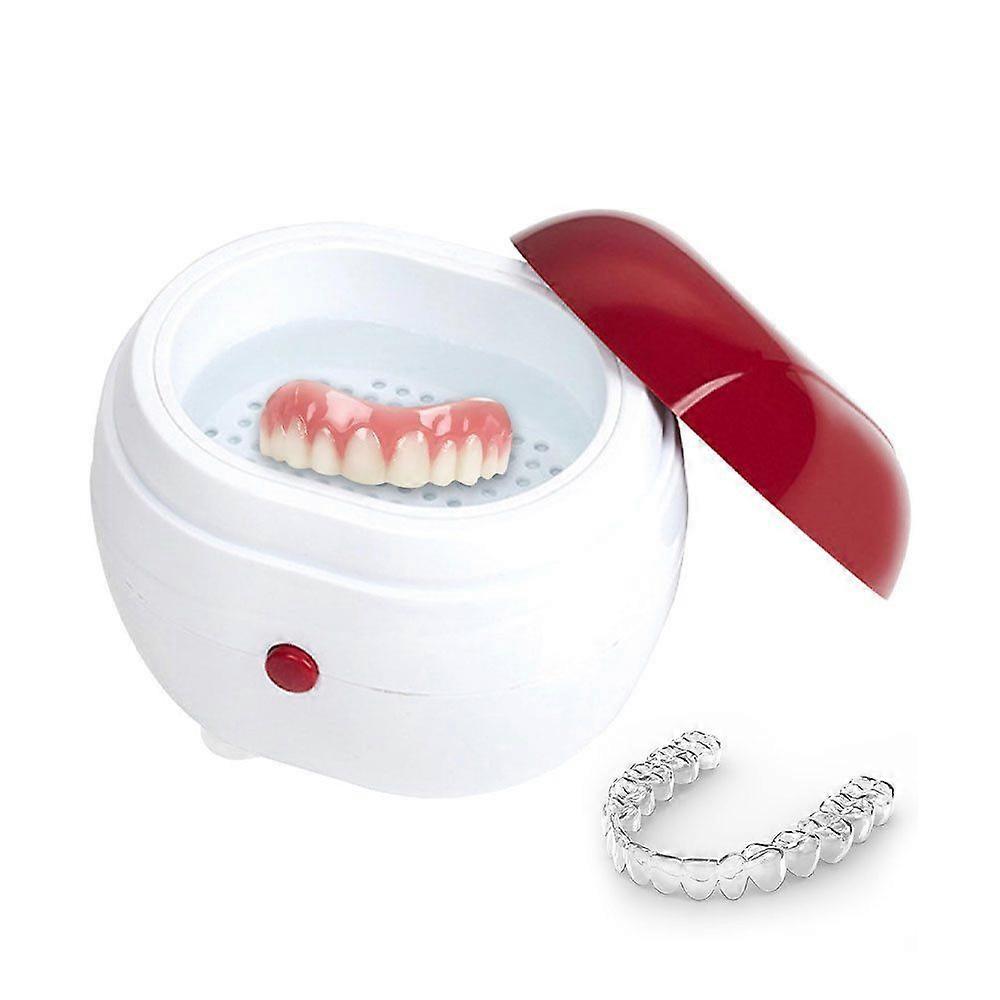 Sonic tooth cleaning device for dentures with advanced ultrasonic technology and care.