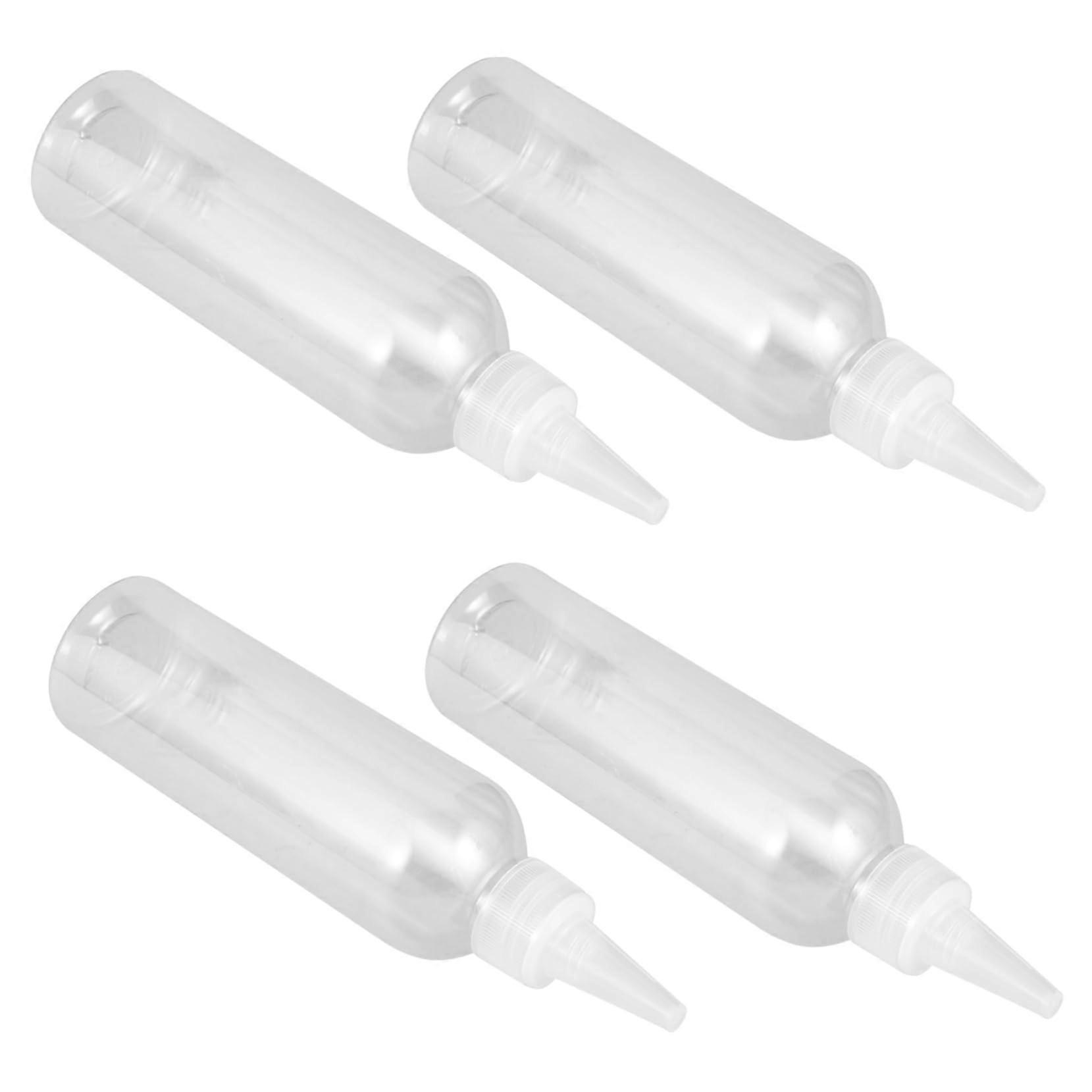 Pack of 4 Travel Squeeze Bottles with Applicator Tips