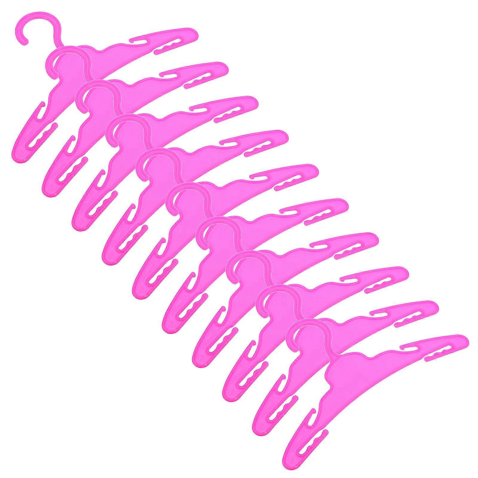 Here's a well structured product description and explanation for the **"10pcs Miniature Doll Clothes Hangers"**:
### π 10pcs Miniature Doll