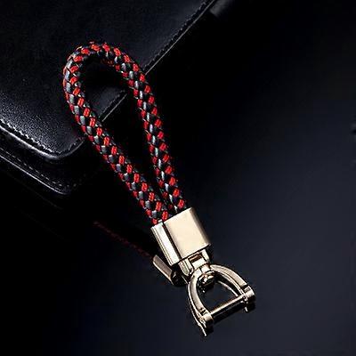 Porte-clés de voiture en cuir tissé de haute qualité rotatif fer à cheval doré boucle femmes hommes porte-clés Charm sac pendentif