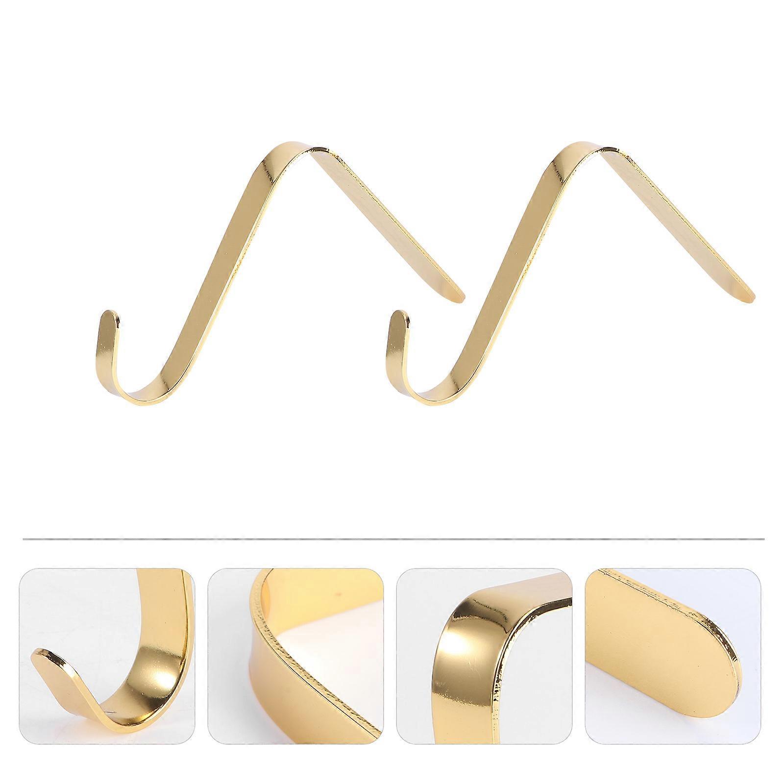 Julstrumphållare i zinklegering för eldstad, 2 st