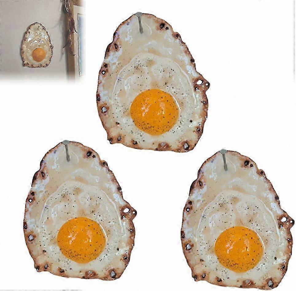 Wall Art Featuring a Fried Egg on a Nail with Sculpted Eggs for Home Decor