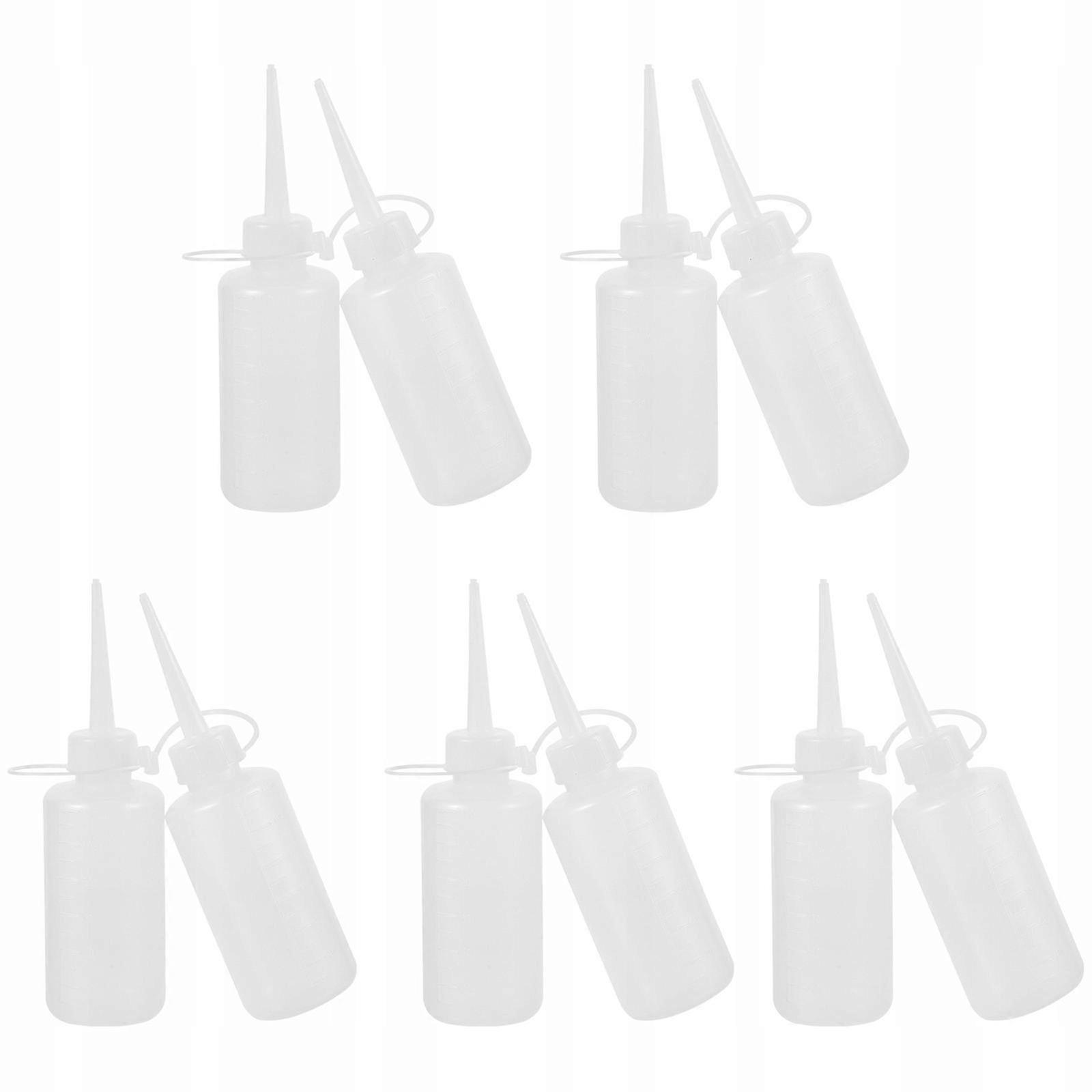 Sewing Machine With A Plastic Glue Container In A Bottle