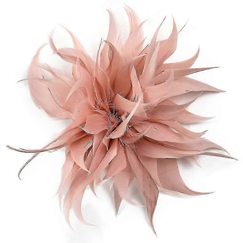 Spilla natalizia per donna con piuma e fiore