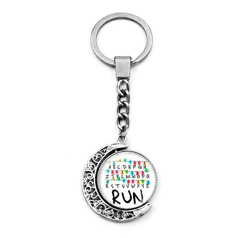 Stranger Things keychain charm, double-sided rotating pendant.