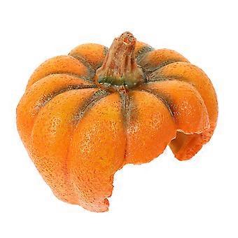 Oranje hars decoratie in de vorm van een pompoen voor een reptielenhol, geschikt voor een schildpaddenverblijf.