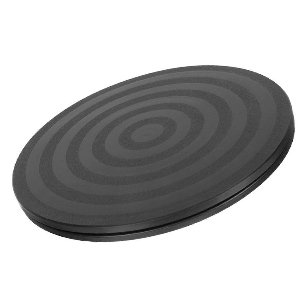 Rotating pottery wheel with stable base for arts and crafts, clay work, and creative projects. Portable and versatile.