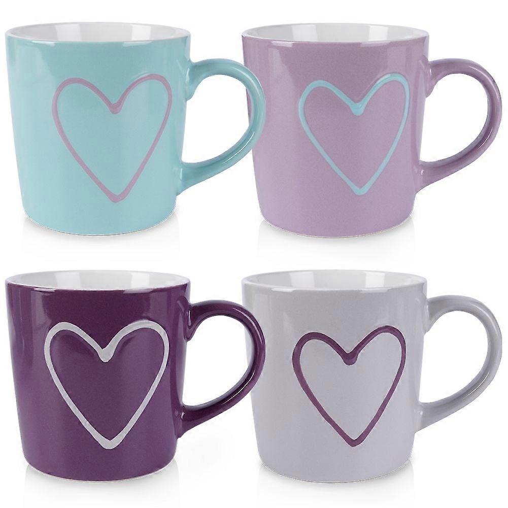 Colourful ceramic cups with heart motifs and comfortable handles