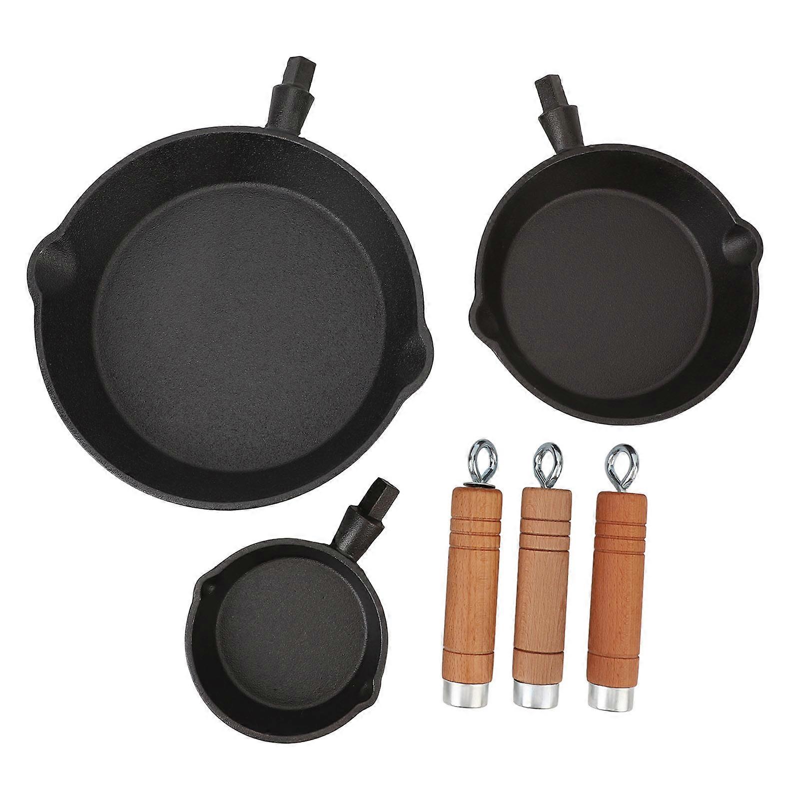 Set of 3 pre-seasoned black cast iron mini skillets with wooden handles and non-stick egg pan