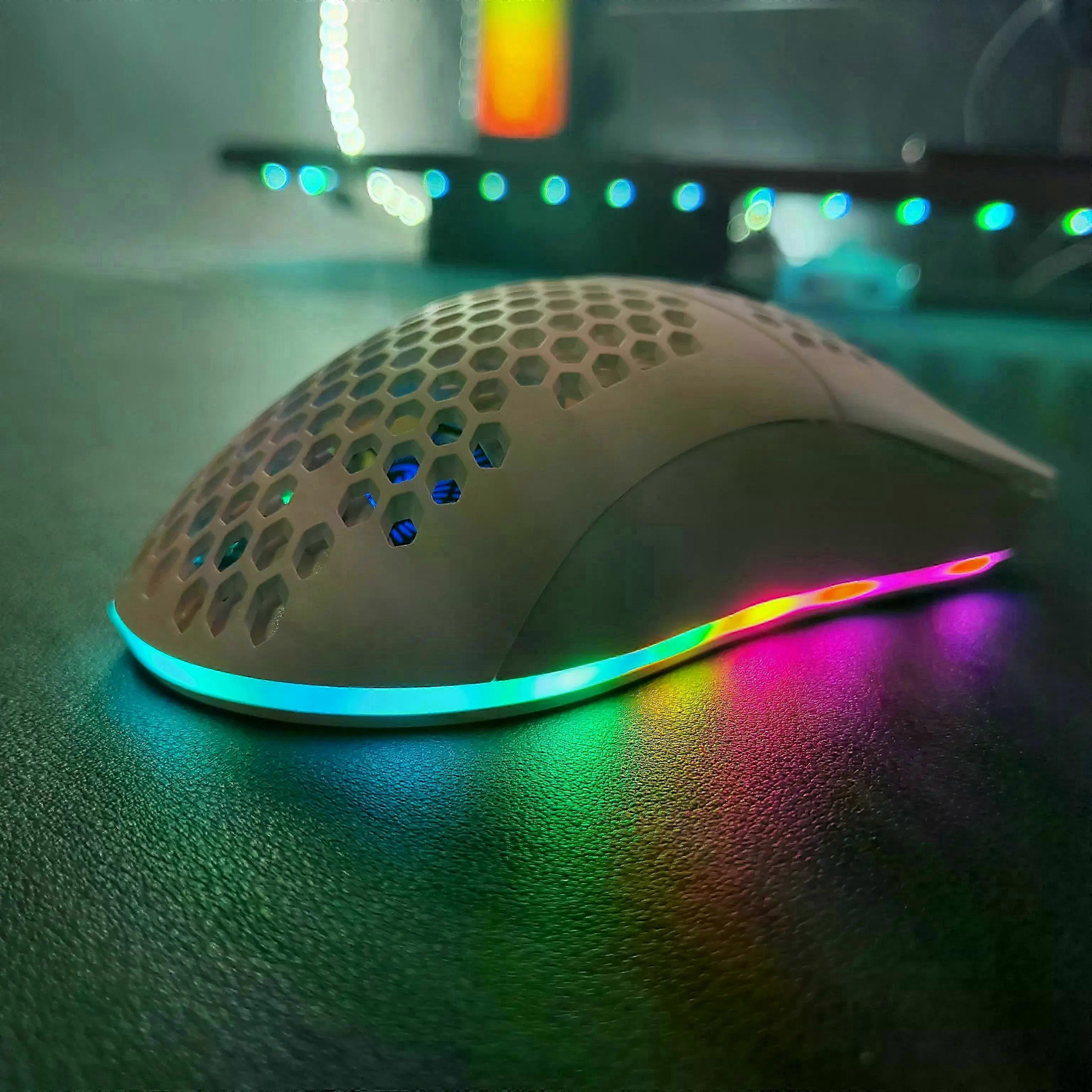 New arrival Tri-mode macro programmable RGB luminous 650mAh rechargeable gaming wireless honeycomb mouse for laptop