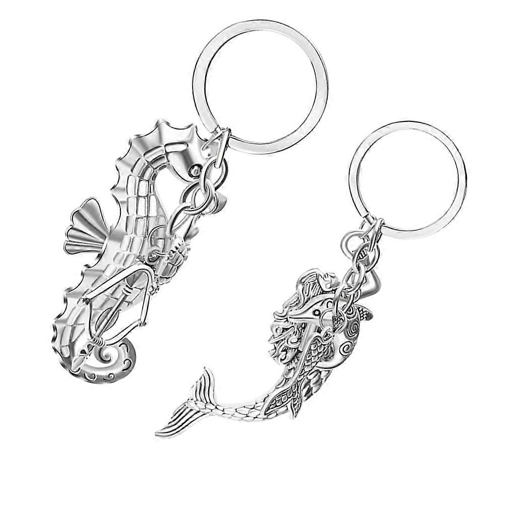 It seems like you're referring to a product listing or description for **vintage keychains** featuring **mermaid and dolphin pendants**, made from