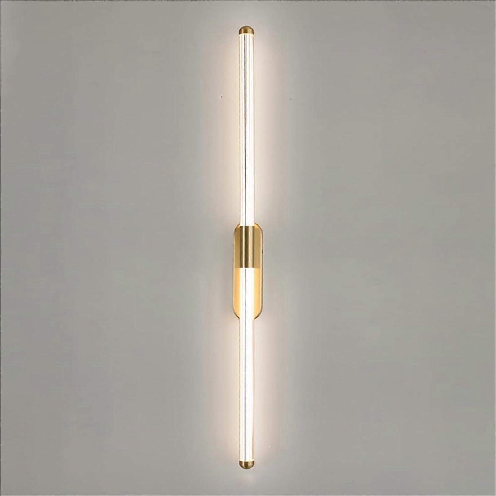 Acrylic LED wall light in golden brass, minimalist Italian linear design