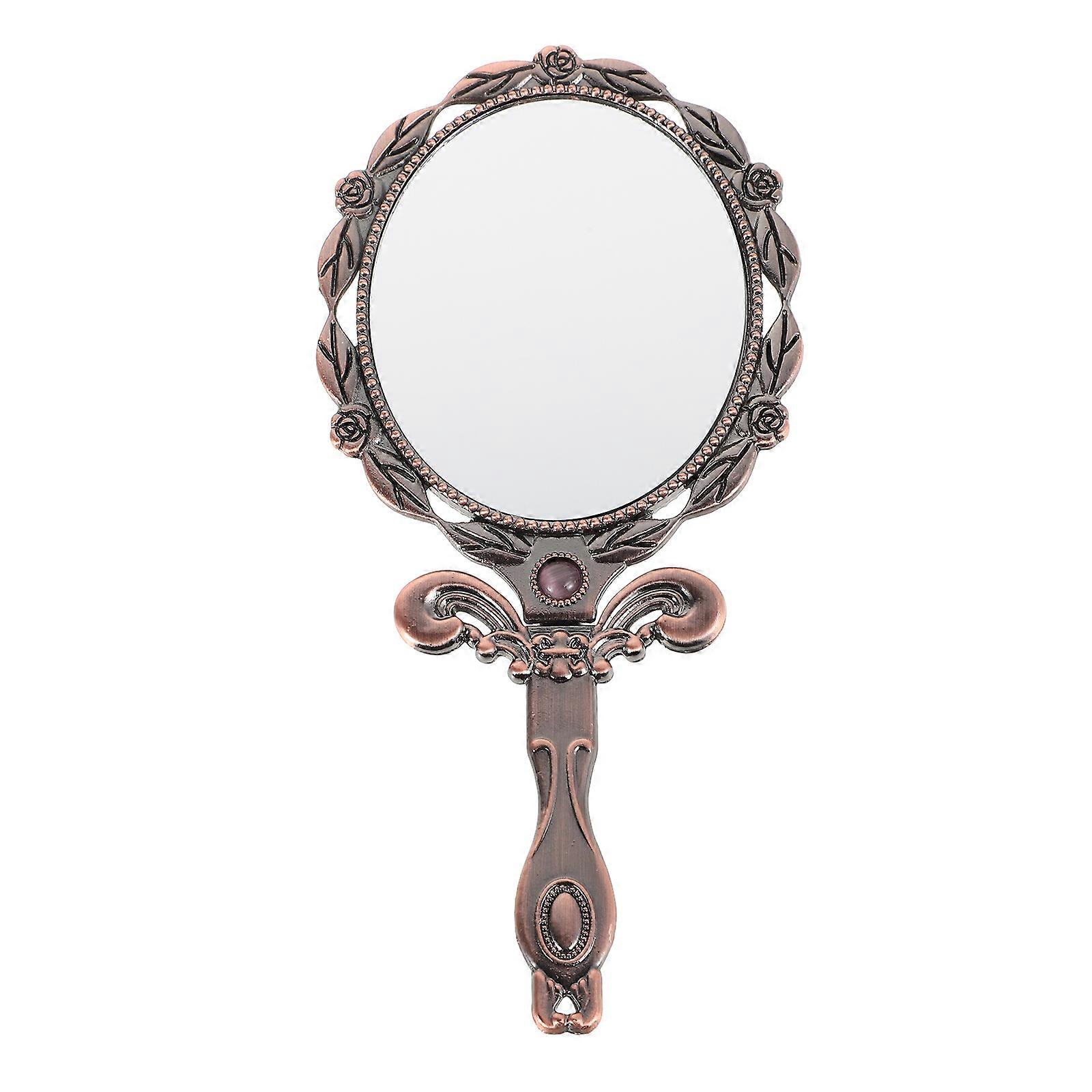Here's a refined and engaging product description for your **Vintage Handheld Makeup Mirror**:

 

### ✨ Vintage Handheld Makeup Mirror – Elegant,