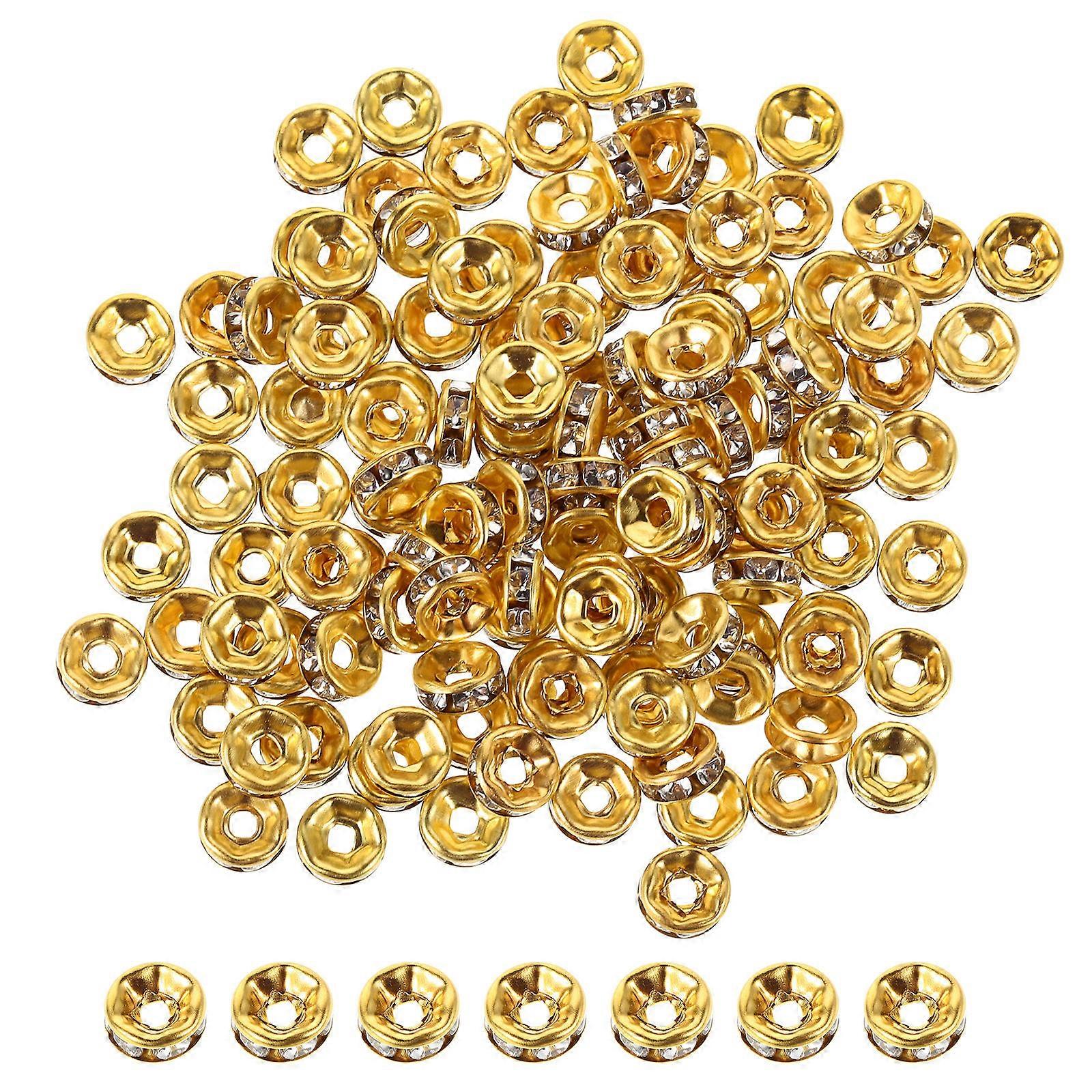 Here's a polished and professional product description based on your input:
**100pcs Golden Rhinestone Rondelle Spacer Beads – Clear Crystal