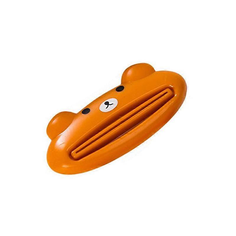 A cartoon toothpaste squeezer: A cute kitchen gadget that makes bathroom cleaning easier!