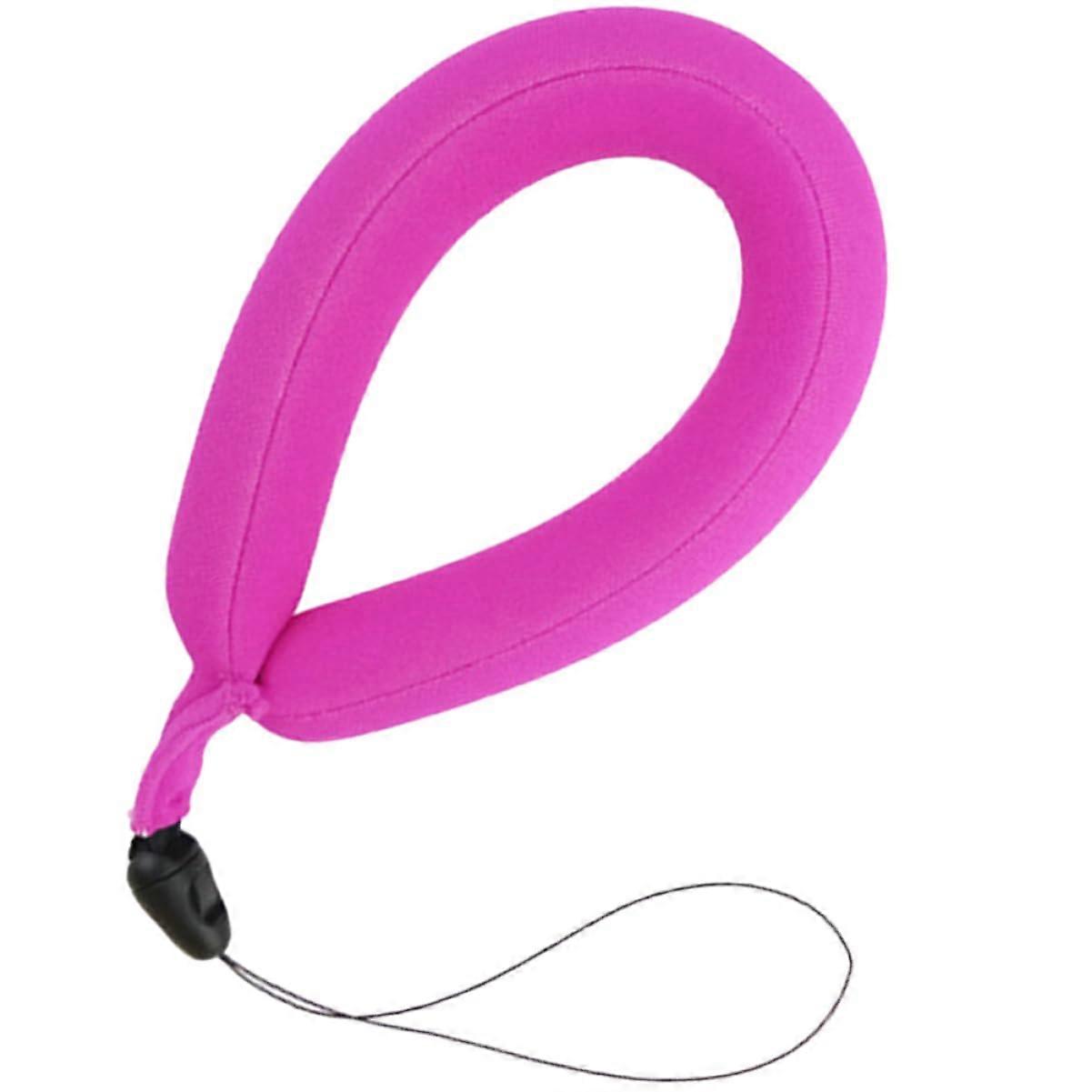 Multifunctional camera strap with wrist loop, practical float and accessories for outdoor photography and water activities, luminous design.