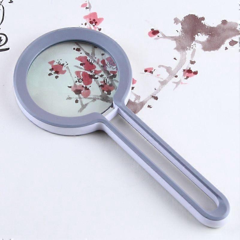 Hand-Held Magnifying Glass