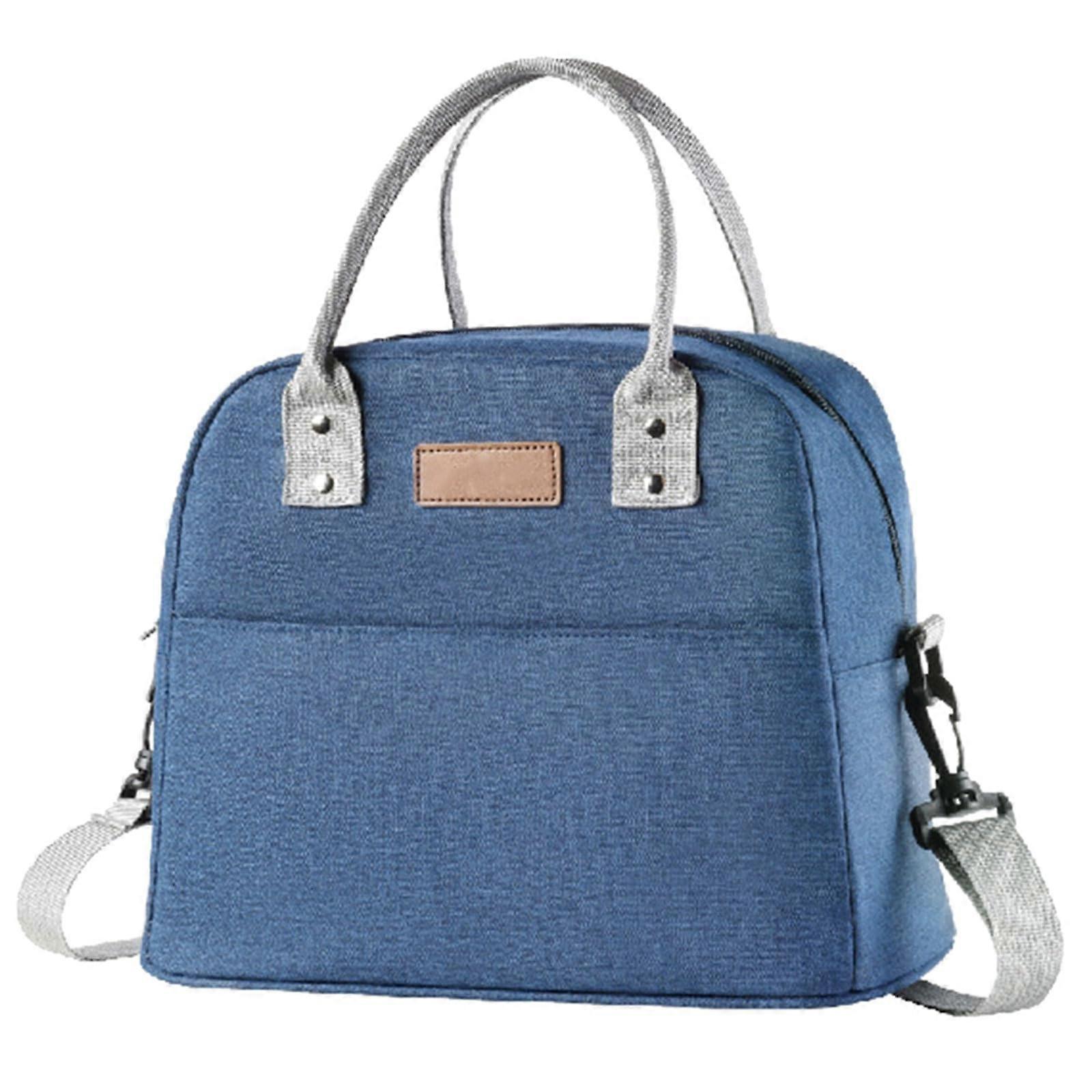 Isolated lunch box with comfortable shoulder strap, large food bag, and drink container for students and travelers, cyan.