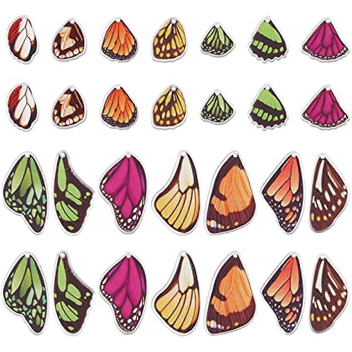 You will receive 56pcs butterfly wings charms in 14 styles