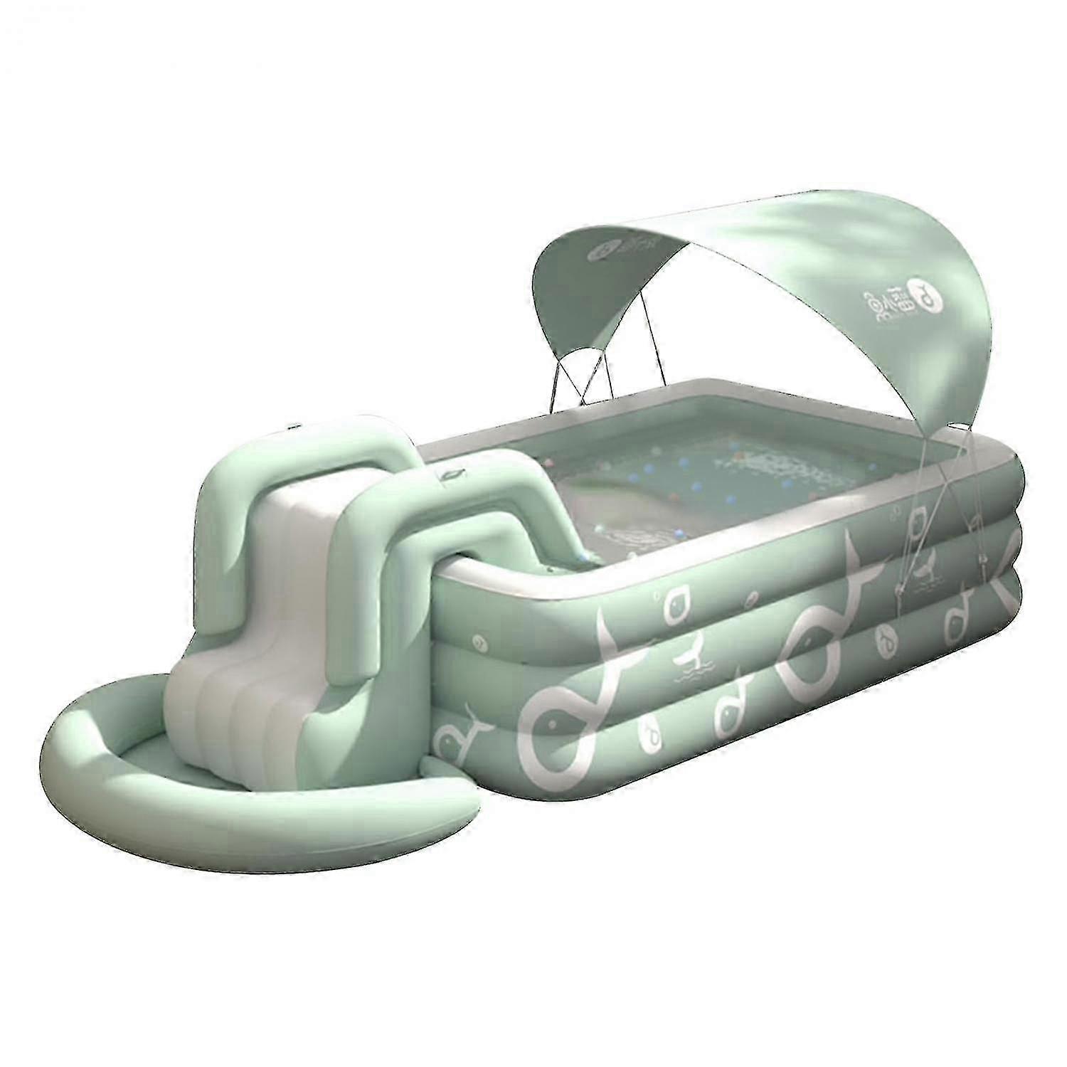 Shaded summer swimming pool. The outdoor inflatable pool features a built-in slide. Above ground swimming pools for children and adults. Relaxation sw