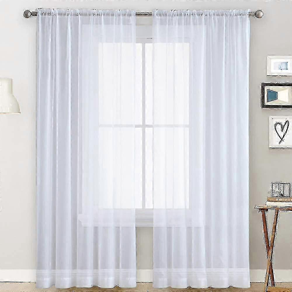 Decorative ruffled voile curtains in linen appearance
