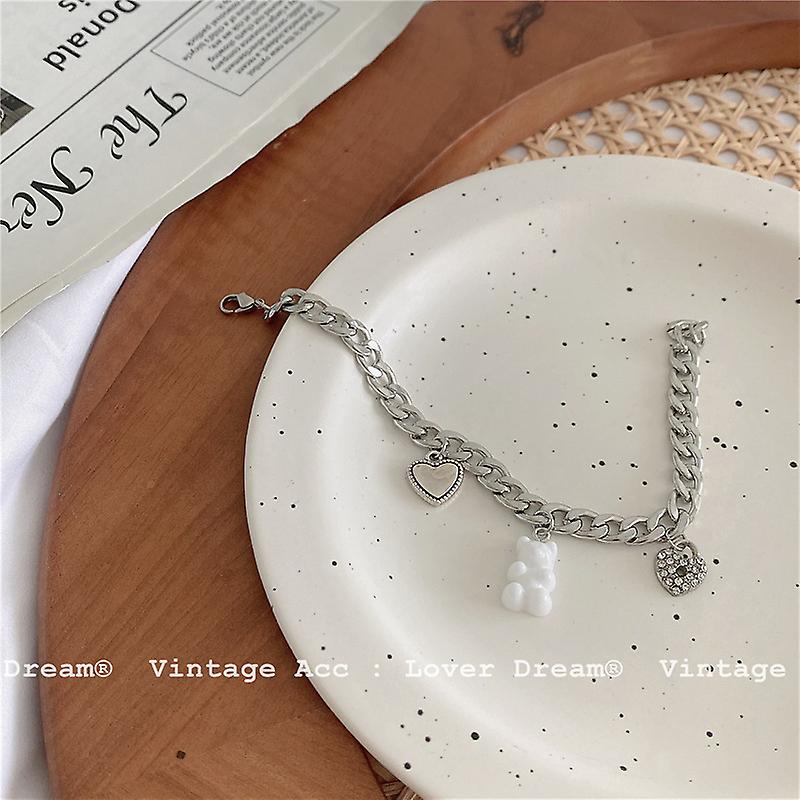 [titan armbånd for jenter: []