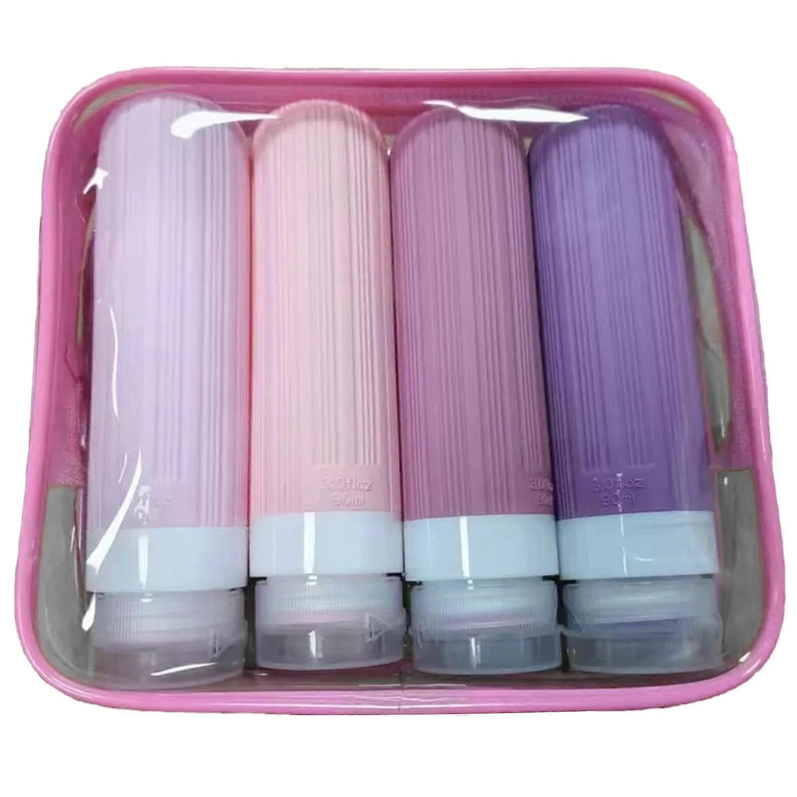 Pack of 4 Portable Travel Containers Easy to Use Silicone Travel Essential Cosmetics Bottles Squeeze Containers Multicolor