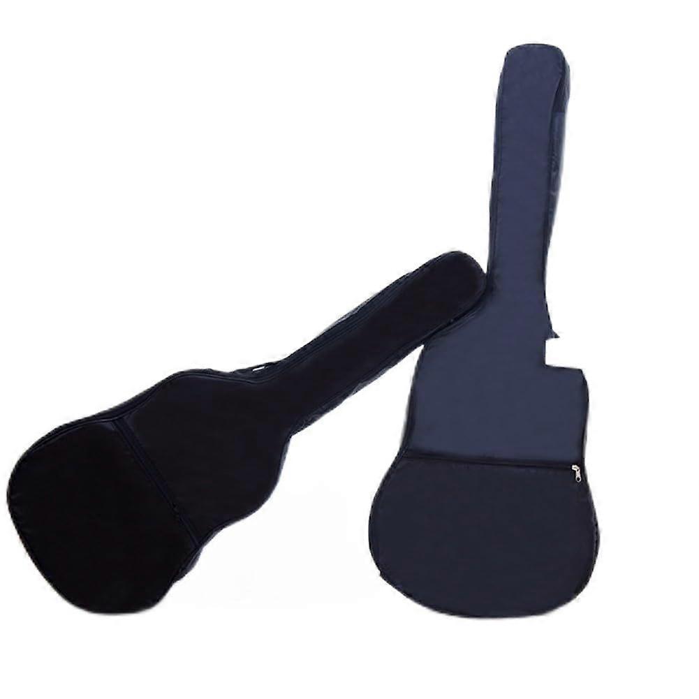 Travelfriendly padded acoustic guitar bag protects instruments up to 104 cm from damage, as shown, 96.52 cm.