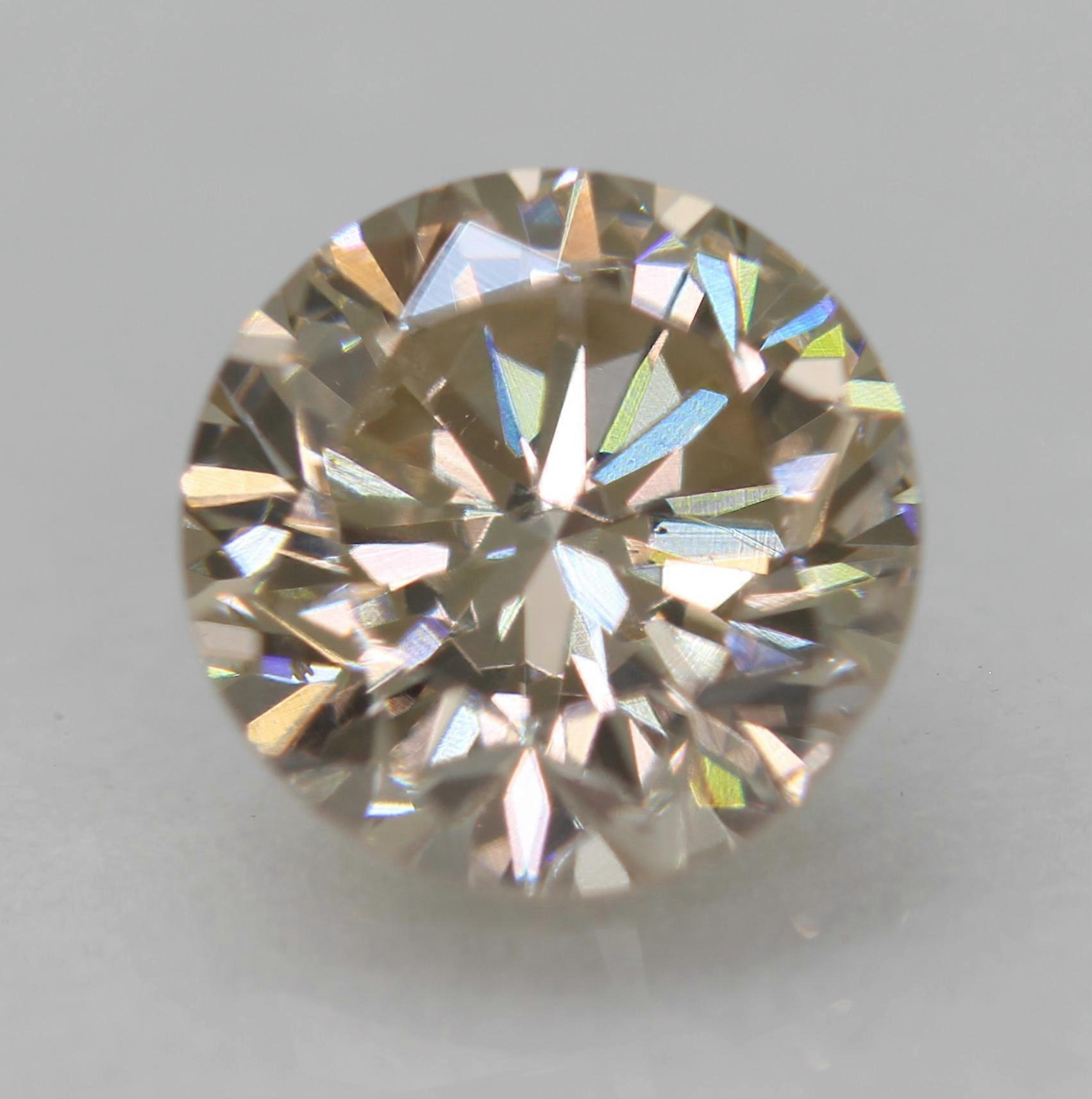 Certified 0.85 Carat L VVS2 Round Brilliant Natural Earth Mined Diamond 5.92mm