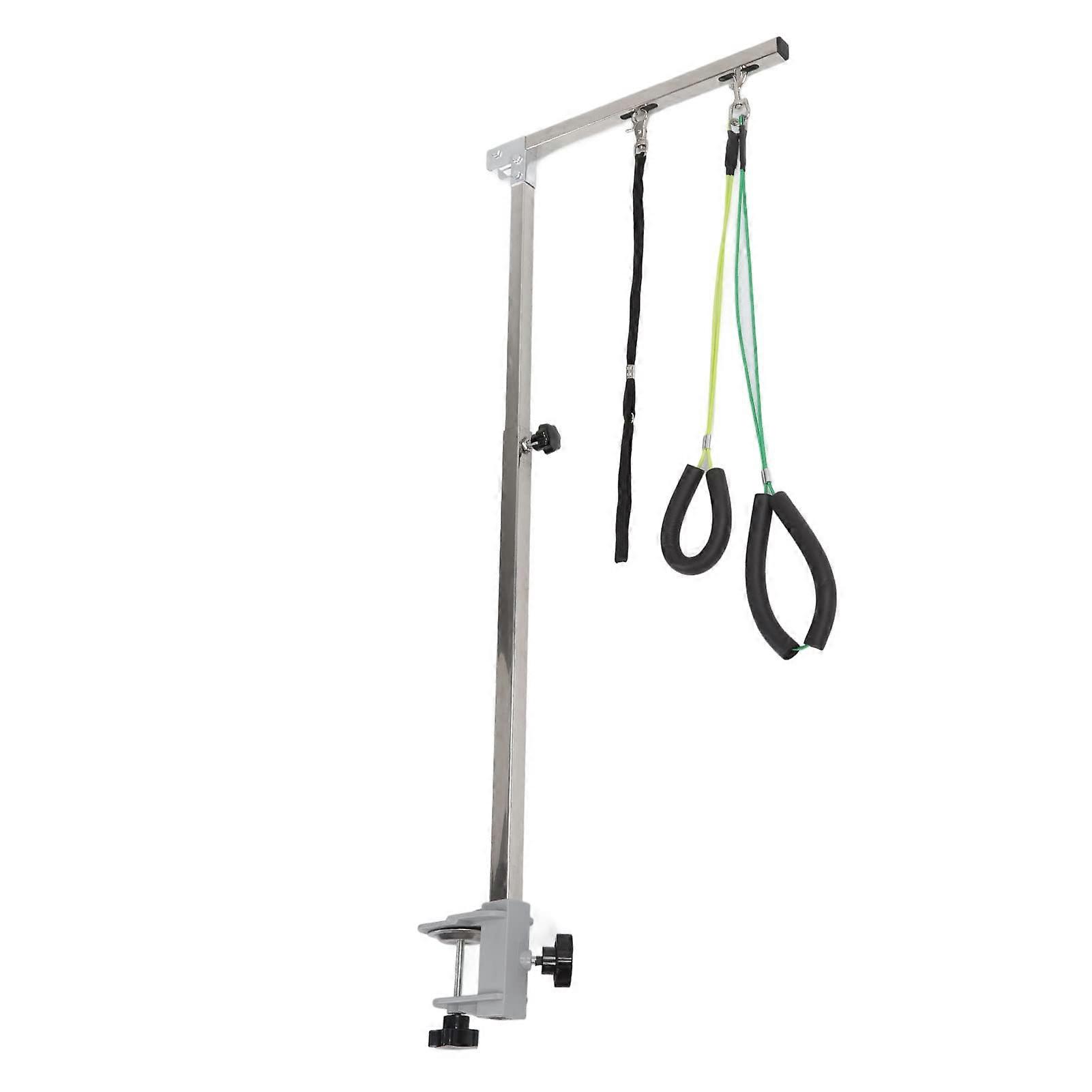 Dog grooming table with two grooming holders and a hammock harness, pet care stand