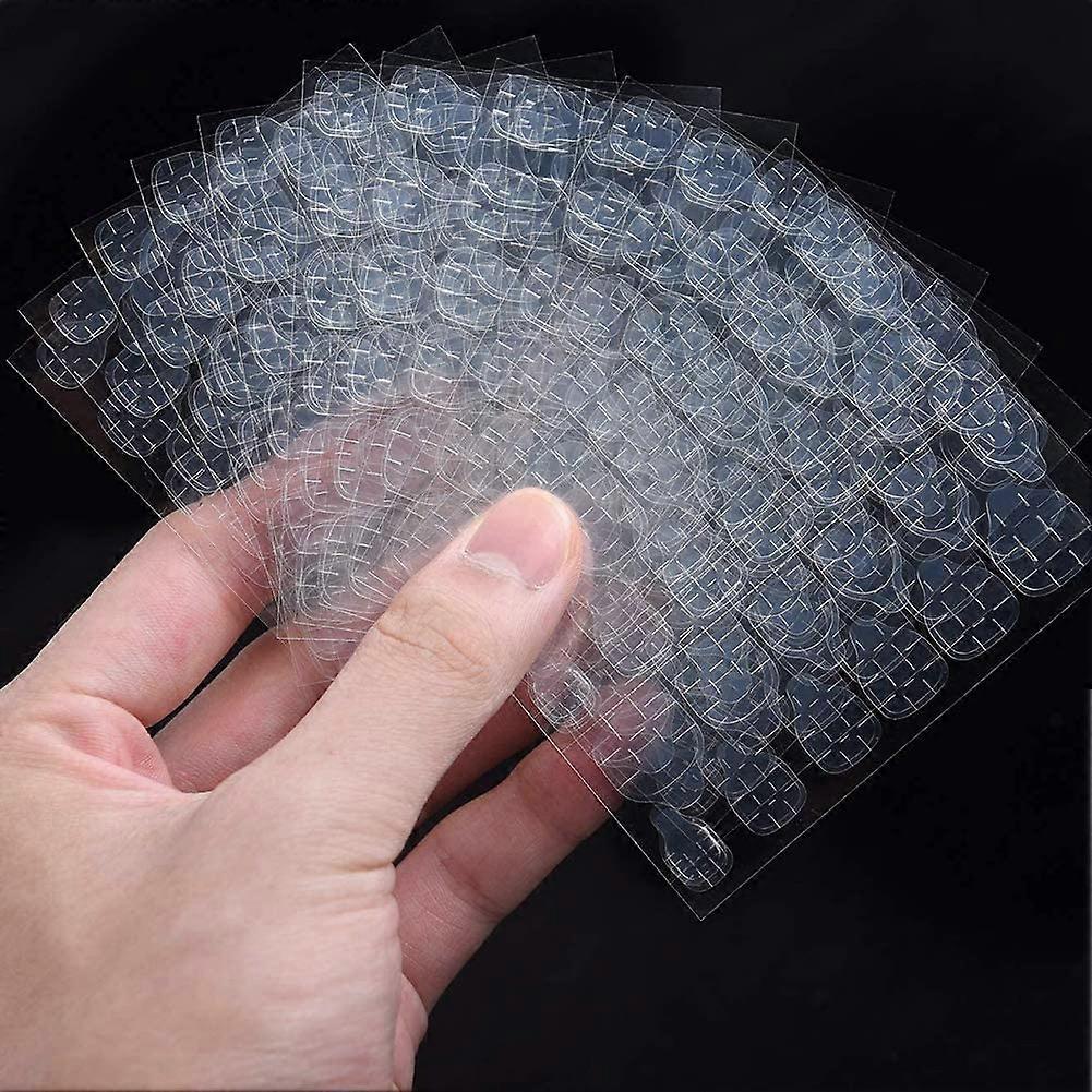 Doppelseitiger Klebe-Nagelaufkleber, selbstklebender transparenter Nagelaufkleber, transparenter doppelseitiger Klebstoff flexible gefälschte Nagelaufkleber für Manikürebedarf.