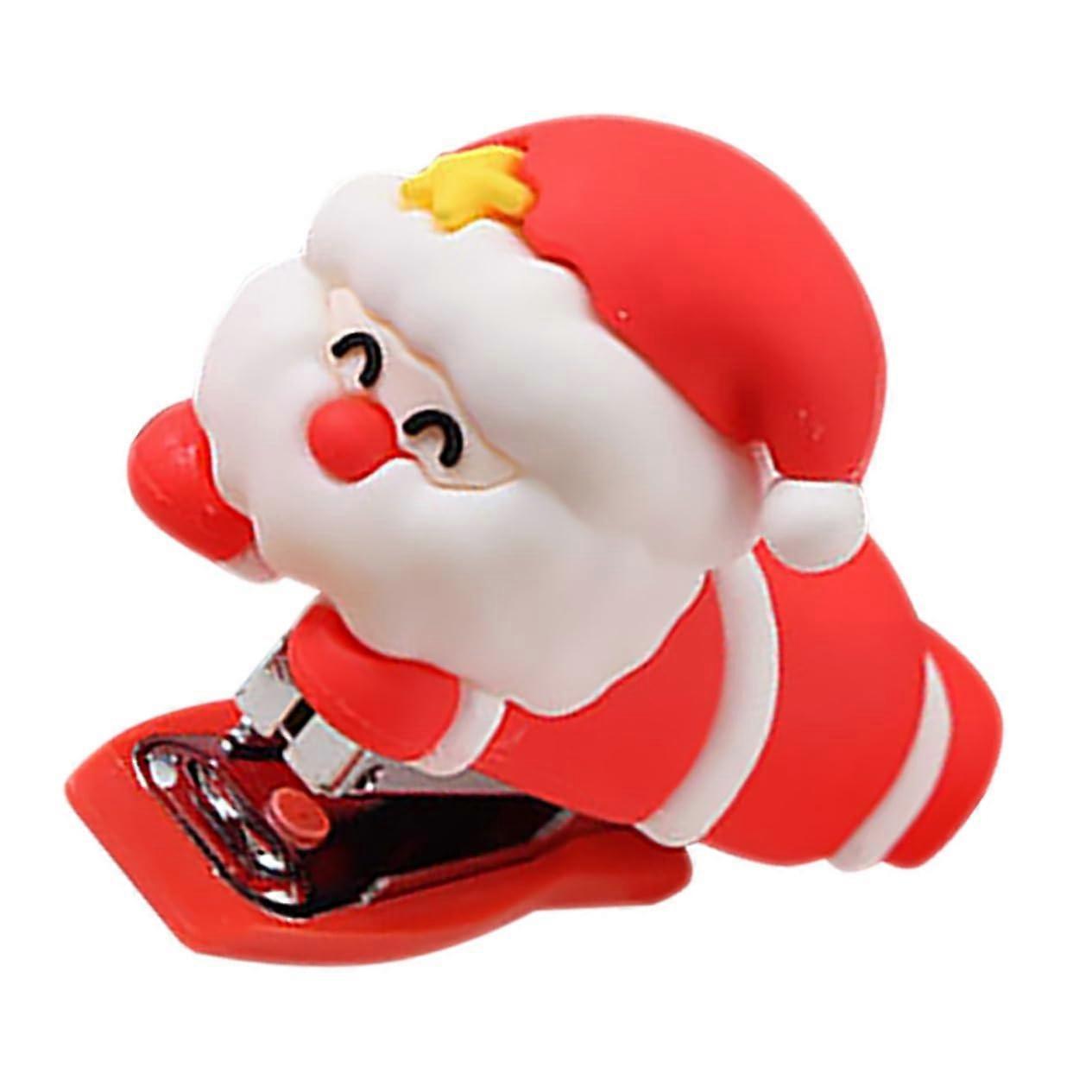 Mini Christmasthemed stapler in cartoon design, accessory for office and school, fun and portable stapler for festive occasions on the go.