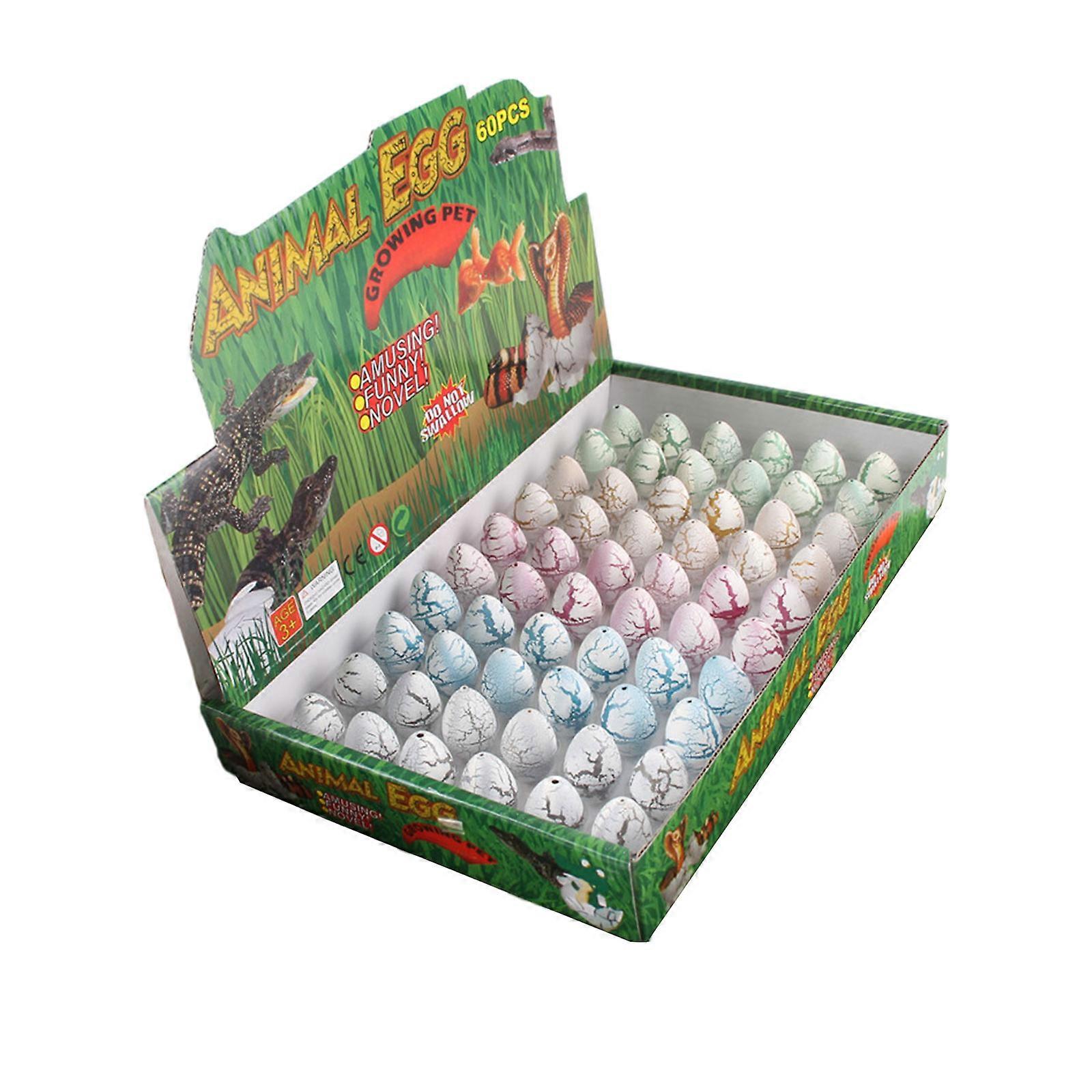 60 PCS μικρά αυγά δεινοσαύρων επώασης για μπομπονιέρες πάρτι δεινοσαύρων Προμήθειες γενεθλίων Goodie Bag Stuffers Βραβεία Μαζική καινοτομία Μεγαλώνουν στο νερό Αυγά Dino με T