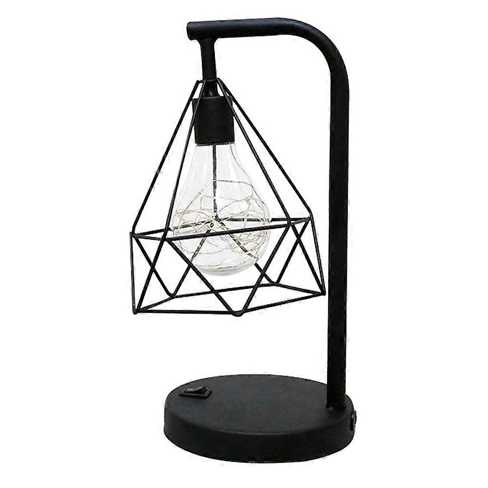 Here's a polished and professional product description based on the title you provided:
**1PC Retro Wire Table Lamp – Battery Operated, Warm