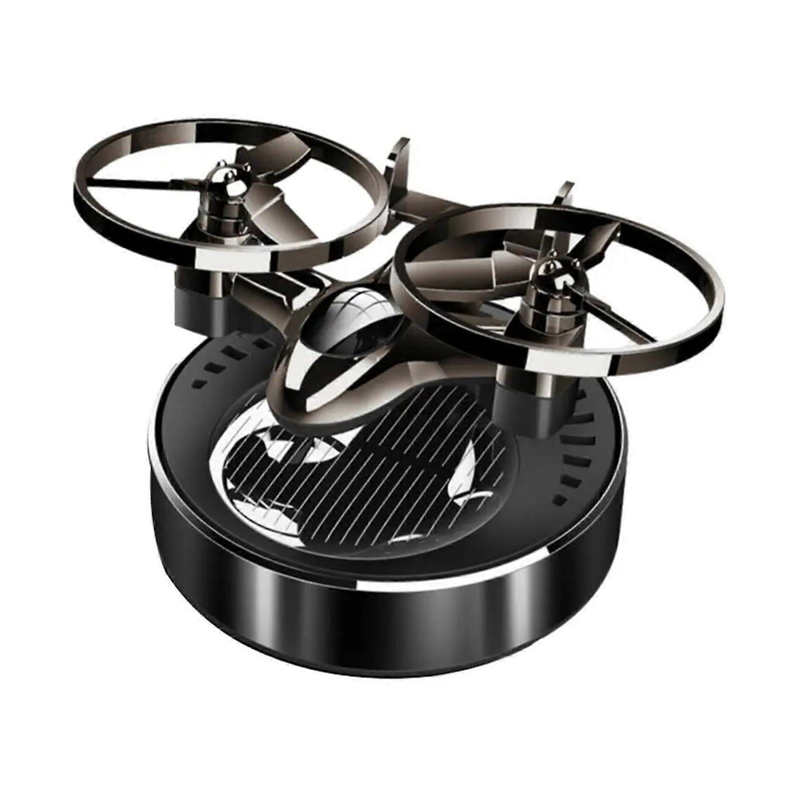 Solar Powered Rotating Car Air Freshener with Metal Plane Design and Interchangeable Fragrance Pads