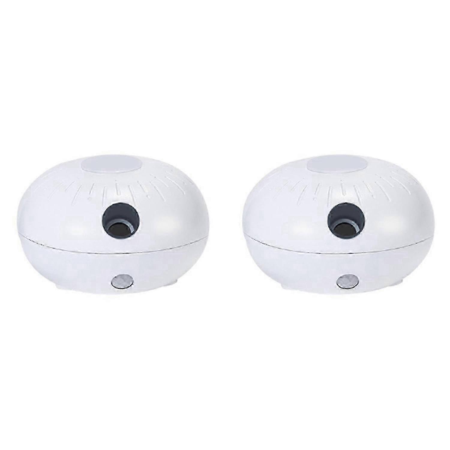 Two mini aroma diffusers, automatic sensor-activated, portable, cute aroma diffusers with USB interface.