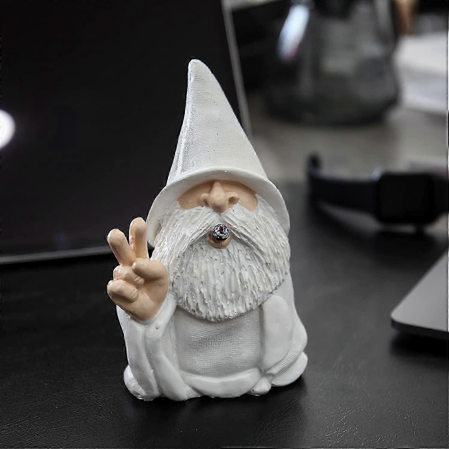 Funny dwarf statue old man with white beard