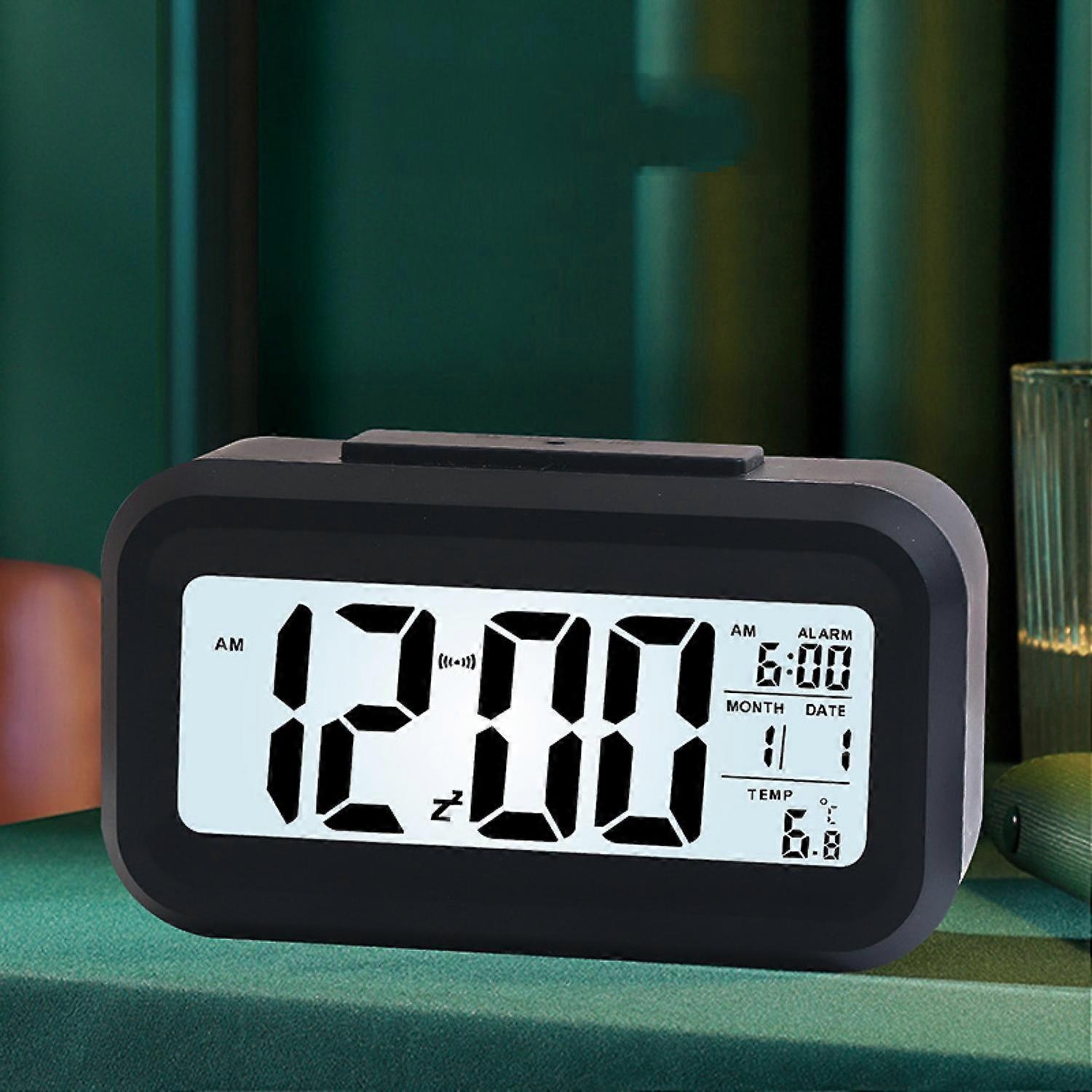 Black digital alarm clock LED display