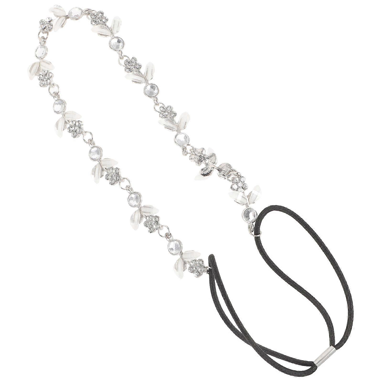 Tiara feminina com strass e elástico prateado.