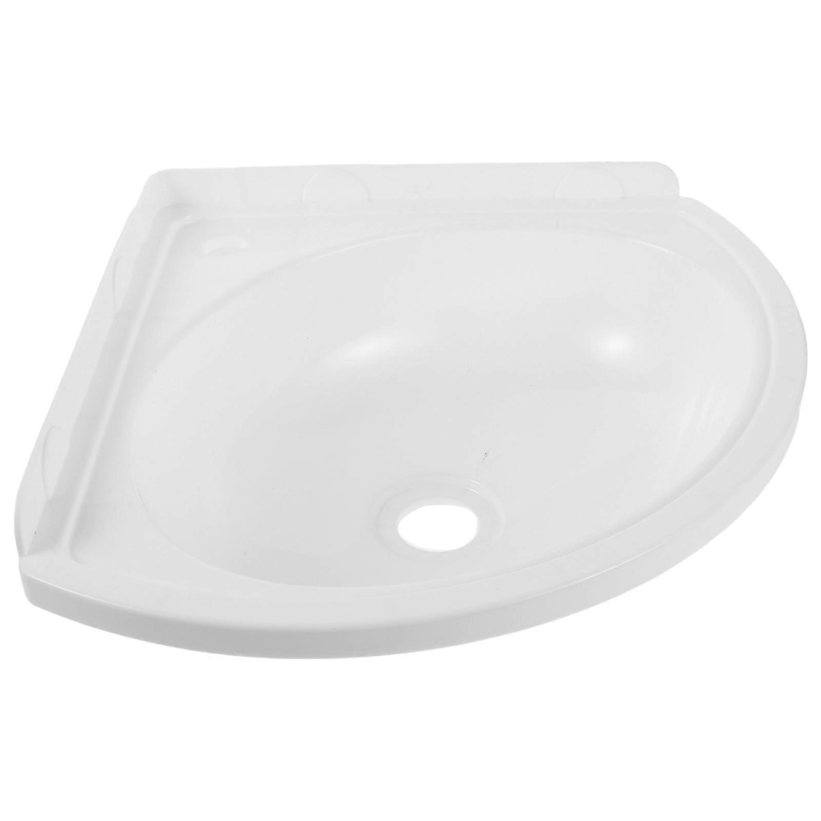 Lavabo de pared triangular para baño, color blanco.