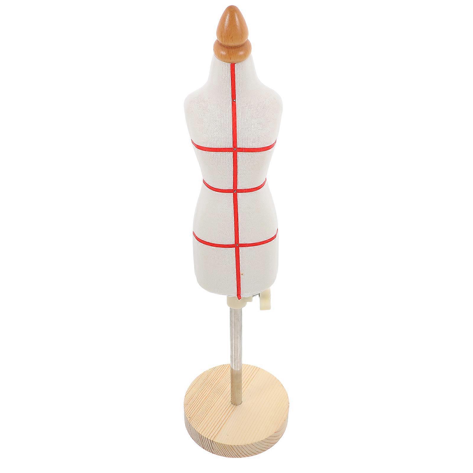 It seems you're referring to a **scale mini sewing mannequin dress form** with specific features like:
**Adjustable height**
**Pinewood base**